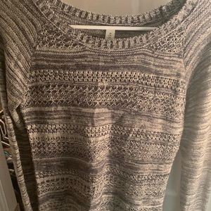 A long grey sweater
